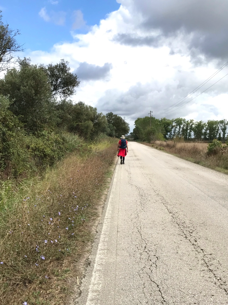 Richard walking along the road