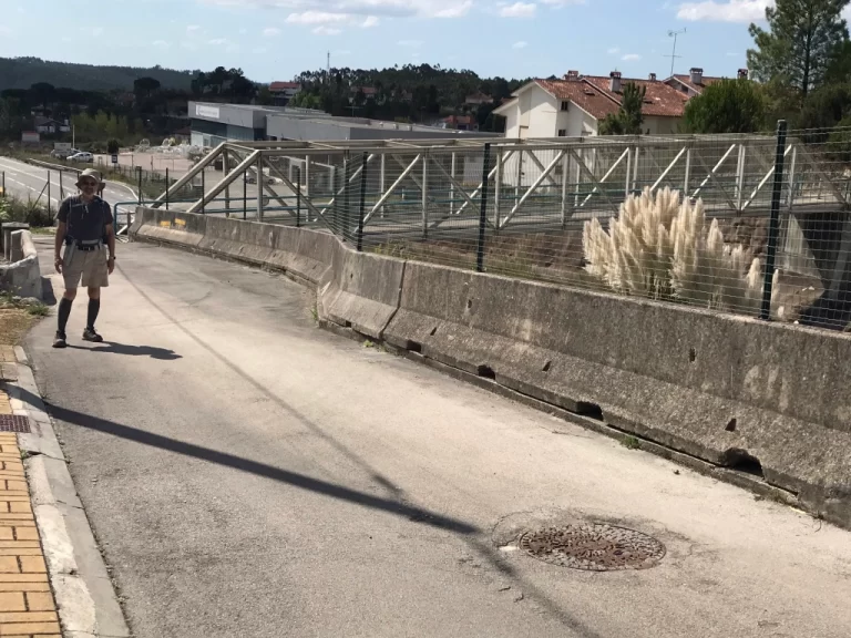 city street with pedestrian overpass in the suburbs of Coimbra