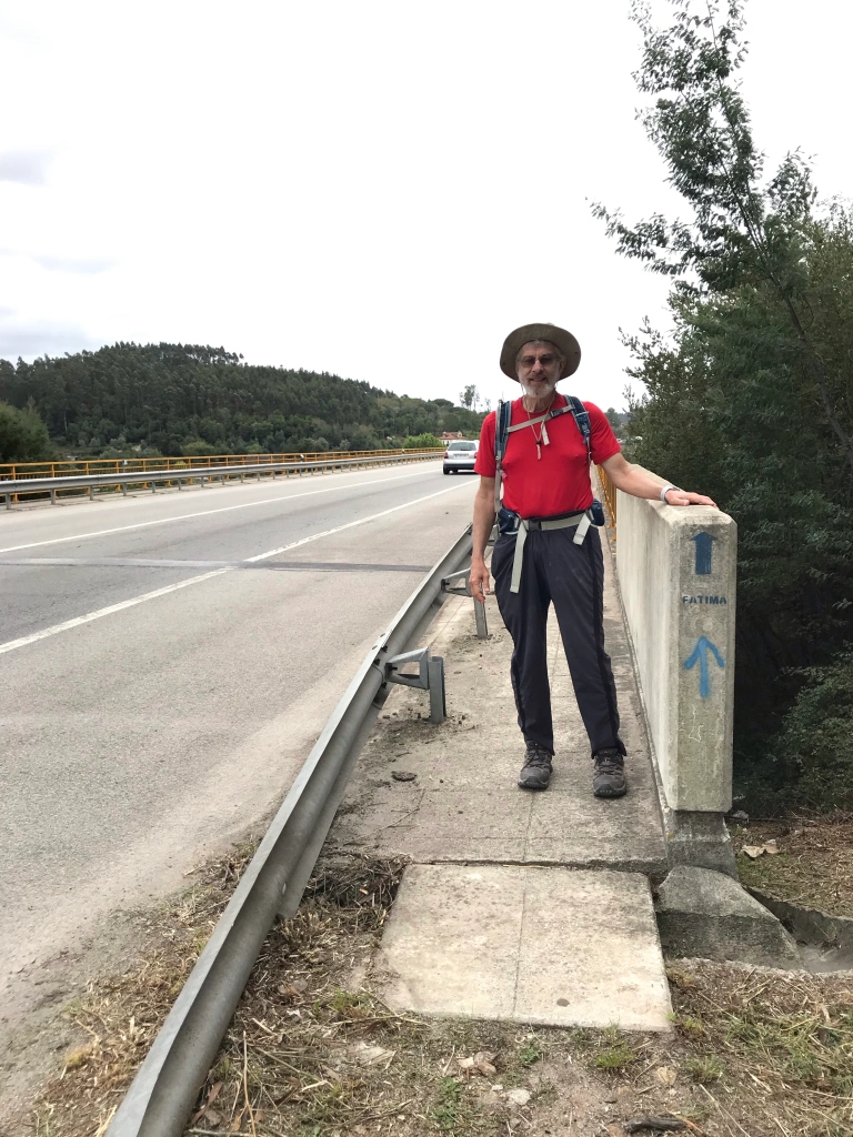 walking along a highway bridge