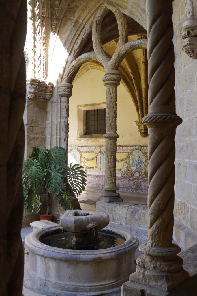 Igraja de Santa Cruz's Manueline cloister with yellow tile Biblical stories