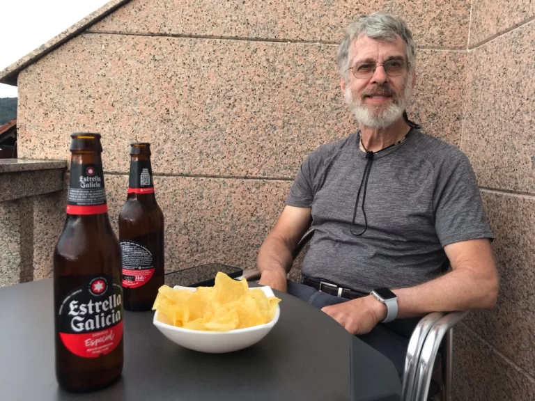 Celebratory beers on Arcade hotel balcony